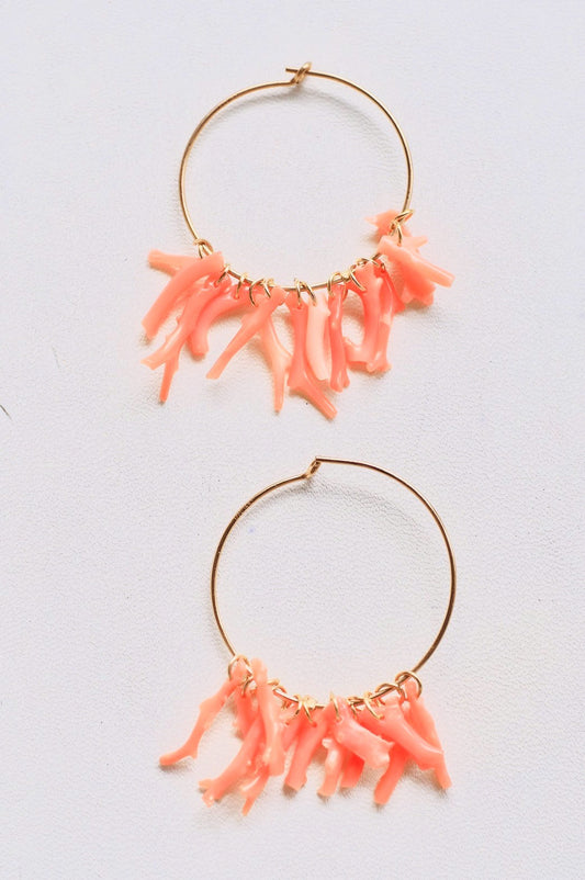 coral hooped pierce