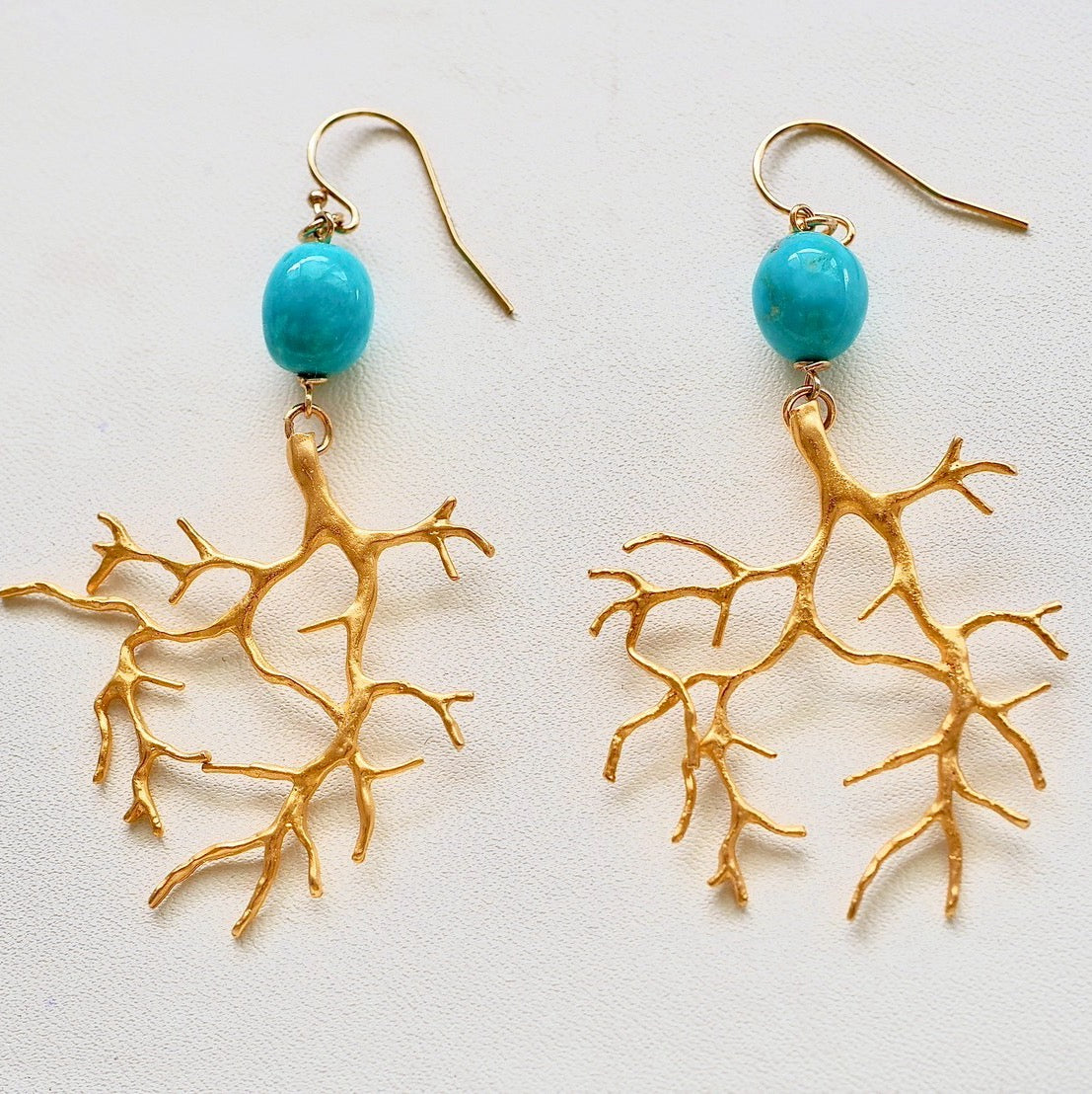 turquoise × branch pierce