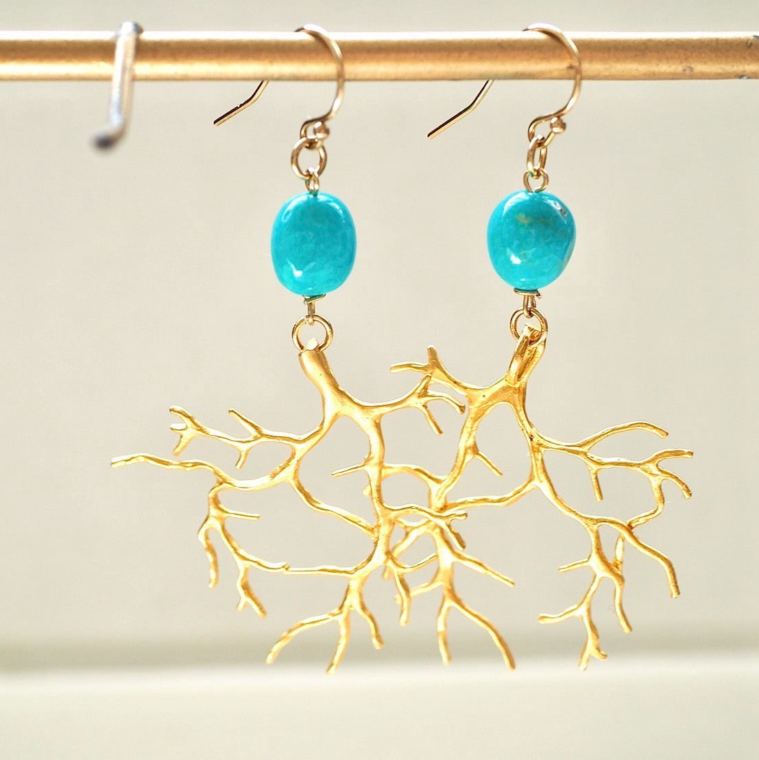 turquoise × branch pierce